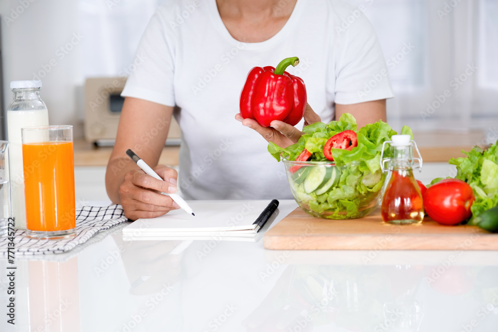 Young woman embraces joyful moments in kitchen. Young woman embraces joyful moments in kitchen.