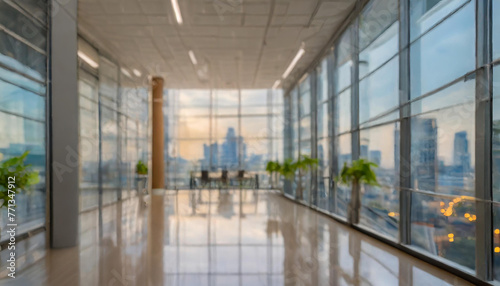 Blurred glass wall of modern business office building at the business center use for background in business concept. Blur corporate business office. Abstract office windows background