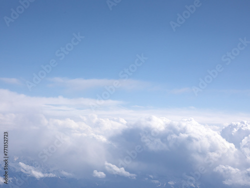 Fototapeta Naklejka Na Ścianę i Meble -  Background view of blue sky and white clouds from an aerial view