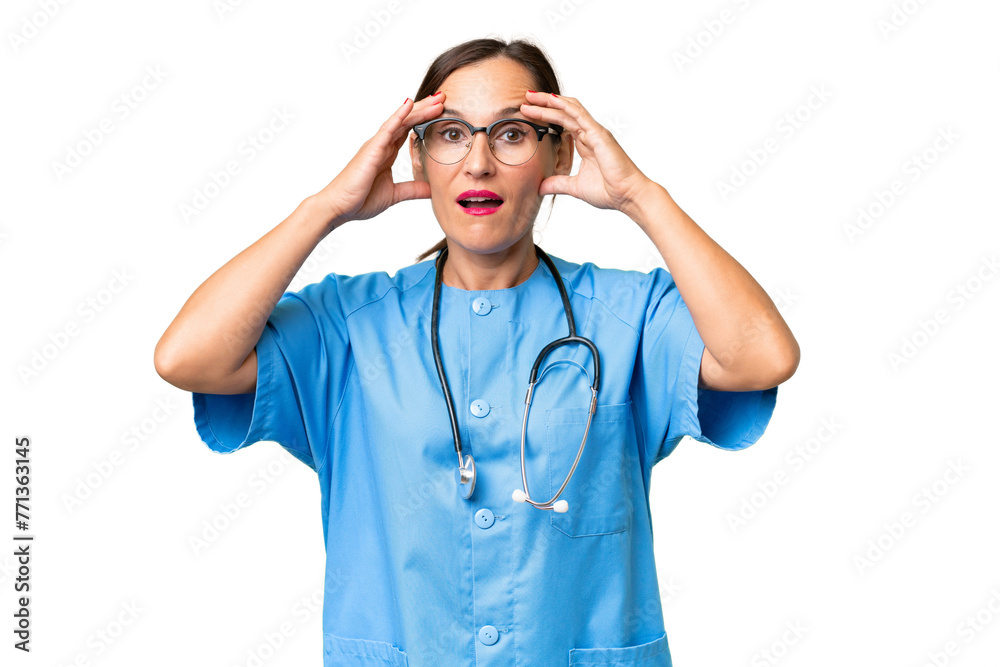 Middle-aged nurse woman over isolated background with surprise expression Middle-aged nurse woman over isolated background with surprise expression