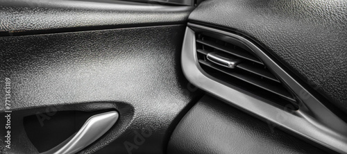 close up of car door, Car console, Air vent in the car, Black artificial leather material, car decoration