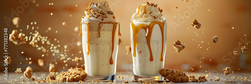 Iced coffee with whipped cream and caramel topping on black background. photo