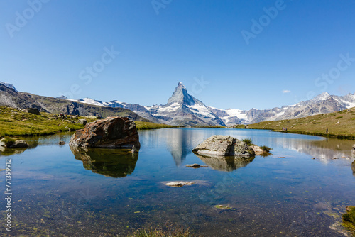 Amazing view of touristic trail near the Matterhorn in the Swiss Alps.