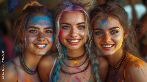 women in multicolored powder holi festival