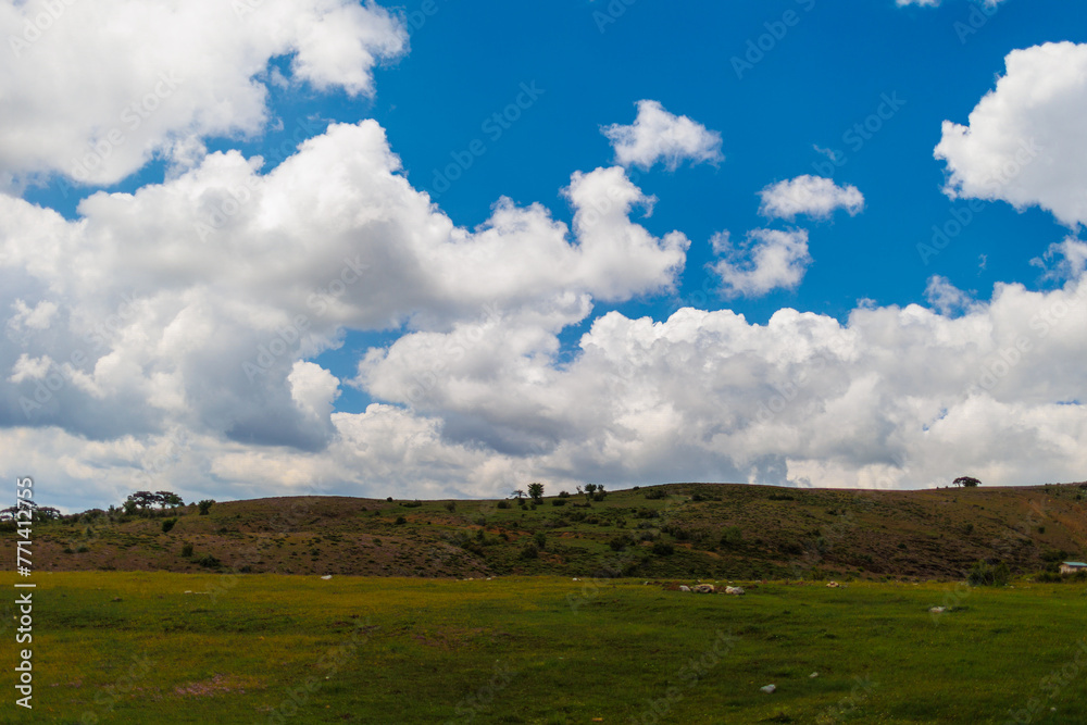 Beautiful colorful landscape. View of the mountain and clouds. Beautiful colorful landscape. View of the mountain and clouds.