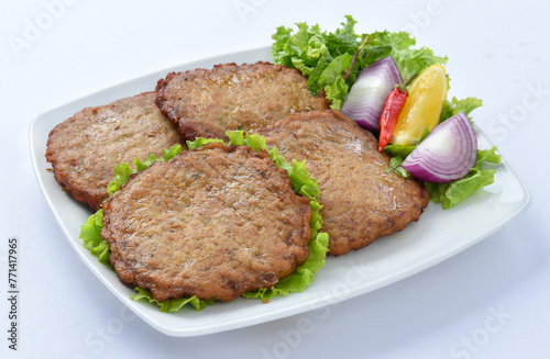 Chicken Chapli kebab or chapli kabab is a Pashtun-style minced kebab, usually made from ground beef, mutton or chicken with various spices in the shape of a patty. 