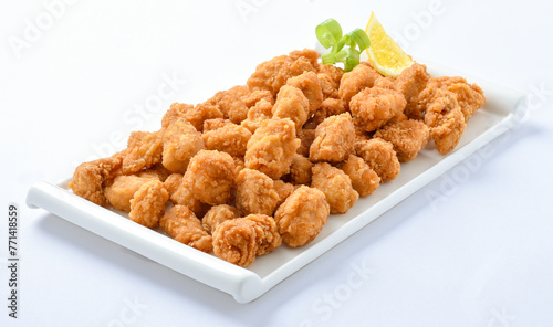 Pop Corn Chicken. Pop Corn chicken is a Snack food product consisting of a small pieces of deboned chicken meat that is breaded or battered, then deep-fried or baked.