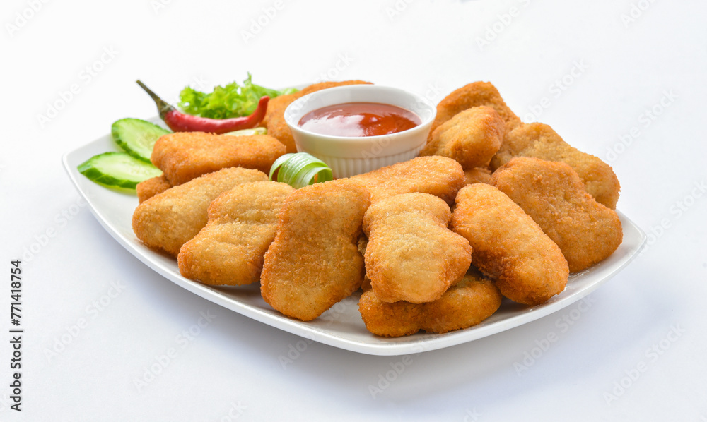 Chicken Nuggets. A chicken nugget is a food product consisting of a small piece of deboned chicken meat that is breaded or battered, then deep-fried or baked. Chicken Nuggets. A chicken nugget is a food product consisting of a small piece of deboned chicken meat that is breaded or battered, then deep-fried or baked.