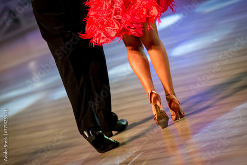 a couple dance a Latin dance. the legs of a dancing couple