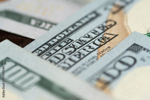 US 100 dollars bills money background, close-up. Narrow Depth of Field. photo