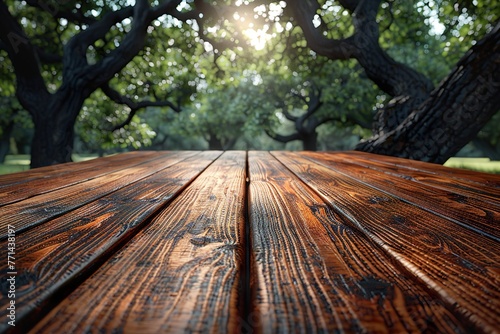 Rustic wooden table in the summer garden. Focus on the foreground.