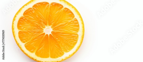 A closeup image of a slice of Valencia orange, a type of citrus fruit, on a plain white background, showcasing the vibrant color and texture of the fruit
