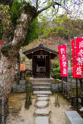 Kobe City, Hyogo Prefecture, Japan - January 8, 2024: Kitano Ijinkan Street, Kitano Tenmangu Shrine is a shrine in Kamikyo Ward, Kyoto, Japan. (Mini fox statues) photo