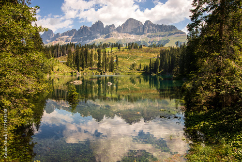 Carezza Lake. Beautifull blue lake in the Dolomites of Trentino Alto Adige, Nova Levante. Paradise landscape at Karersee with mountain Latemar. Italy.