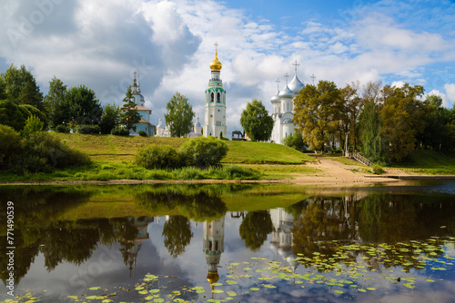 View of the architectural ensemble of the Kremlin Square from the Vologda River and its reflection in the water. Vologda, Russia