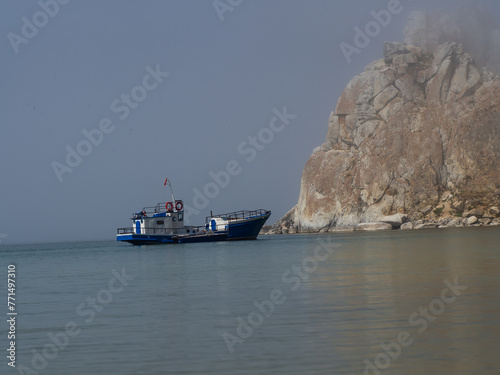 Boats on the bay of the lake