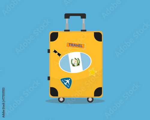 Suitcase or baggage with Guatemala flag, holiday and vacation idea