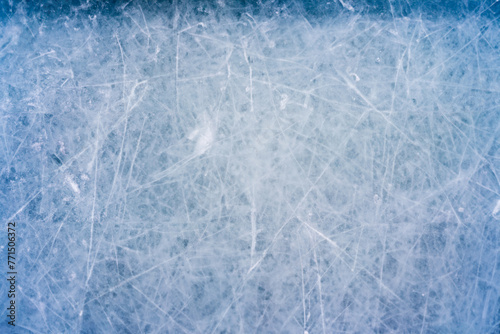 Icy Canvas, Abstract Patterns of Skating and Hockey Marks on Blue Rink Surface Texture.