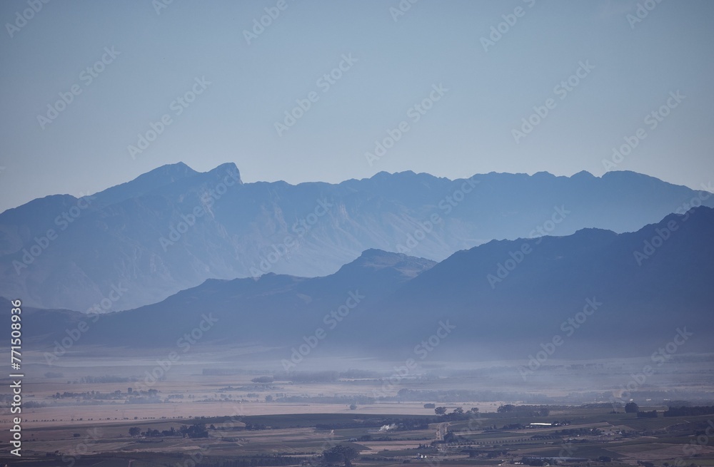Aerial view of a majestic mountainous landscape surrounding the Paarl in South Africa