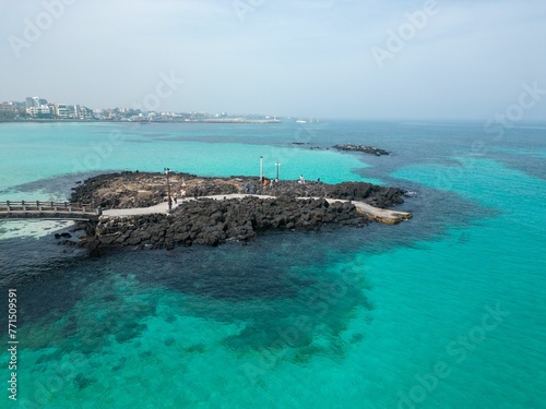 Tranquil waters and towering cliffs beyond South Korea, Jeju in spring