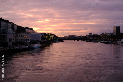 A view of the Seine River at dusk. Paris, France - March 18, 2024.