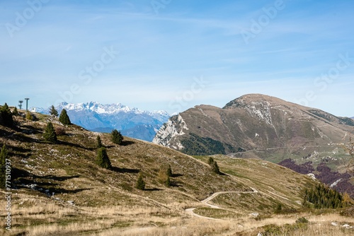 Scenic mountain landscape with snowy peaks in the distance on a sunny day