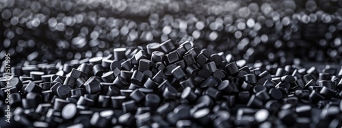 Close up 3D illustration of black plastic pellets a type of polymer resin photo