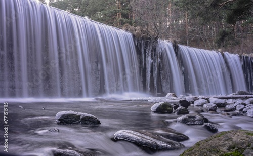Fototapeta Naklejka Na Ścianę i Meble -  Waterfall of the Lozoya waterfall in Pradillo reservoir in Madrid, Spain