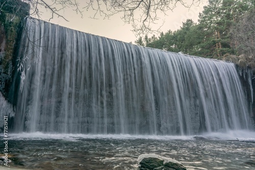 Waterfall of the Lozoya river, Pradillo reservoir in Madrid, Rascafria, Spain