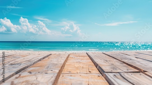 Empty wooden table with white sand calm sea bay blue sky, Beautiful summer nature vacation island in the background with copy space, blank for text ads, and graphic design