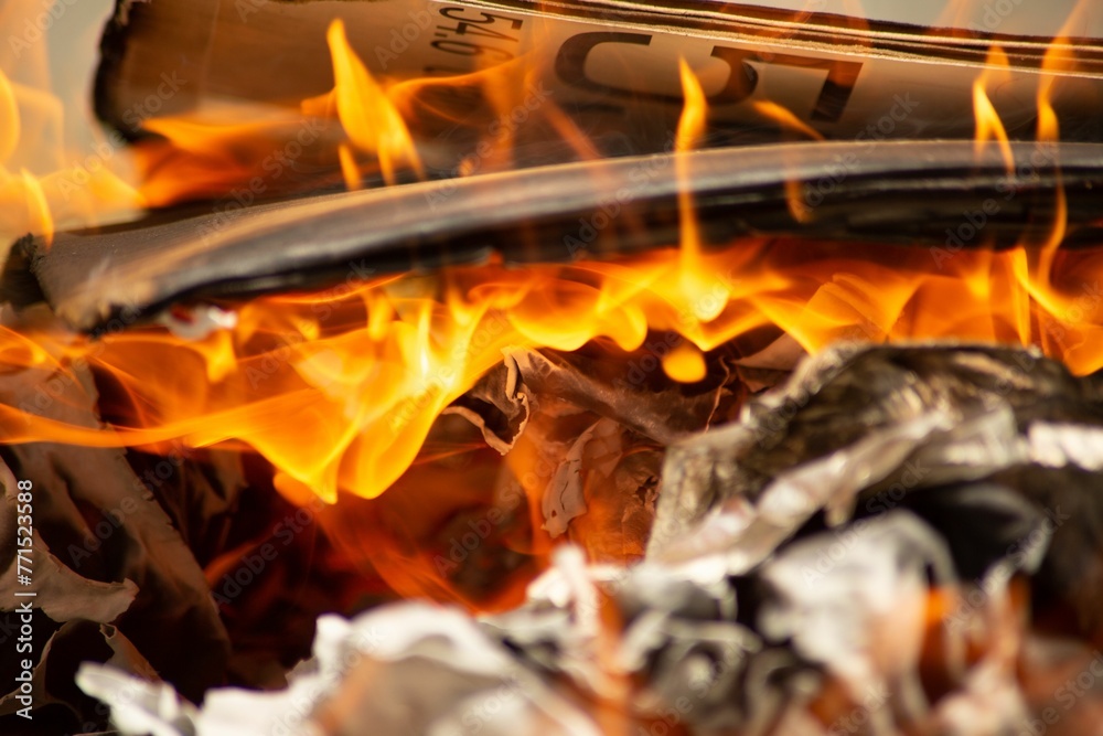 Burning pile of cardboard in a glowing fire. Burning pile of cardboard in a glowing fire.