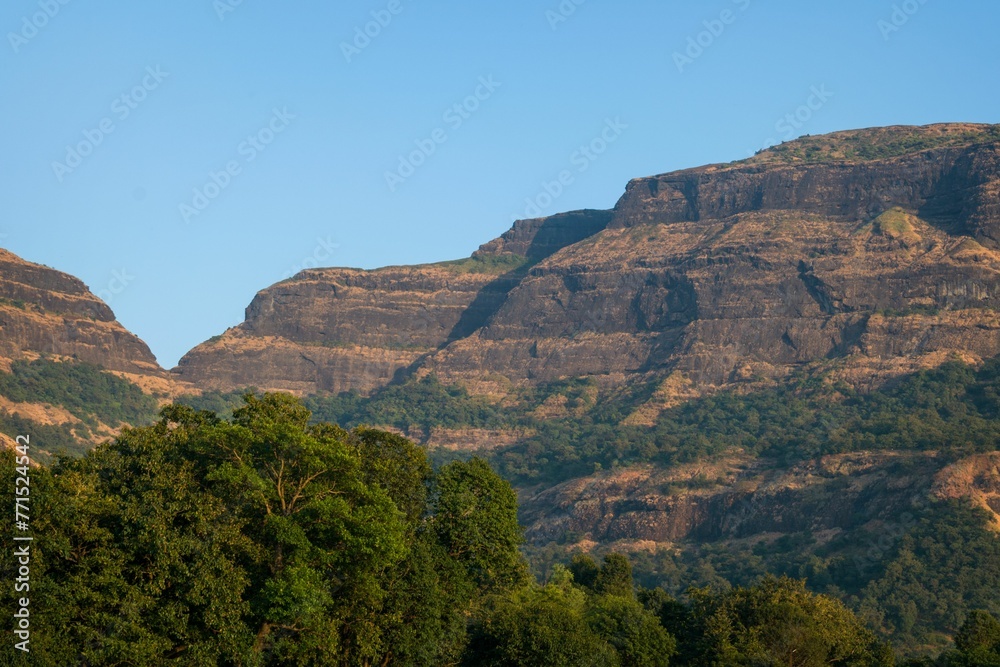Beautiful green landscape with hills at Arthur Lake in Bhandardara in Maharashtra, India