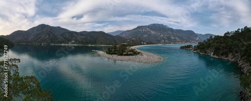 Scenic panoramic view of Blue Lagoon surrounded by majestic mountains. Oludeniz, Fethiye, Turkey.