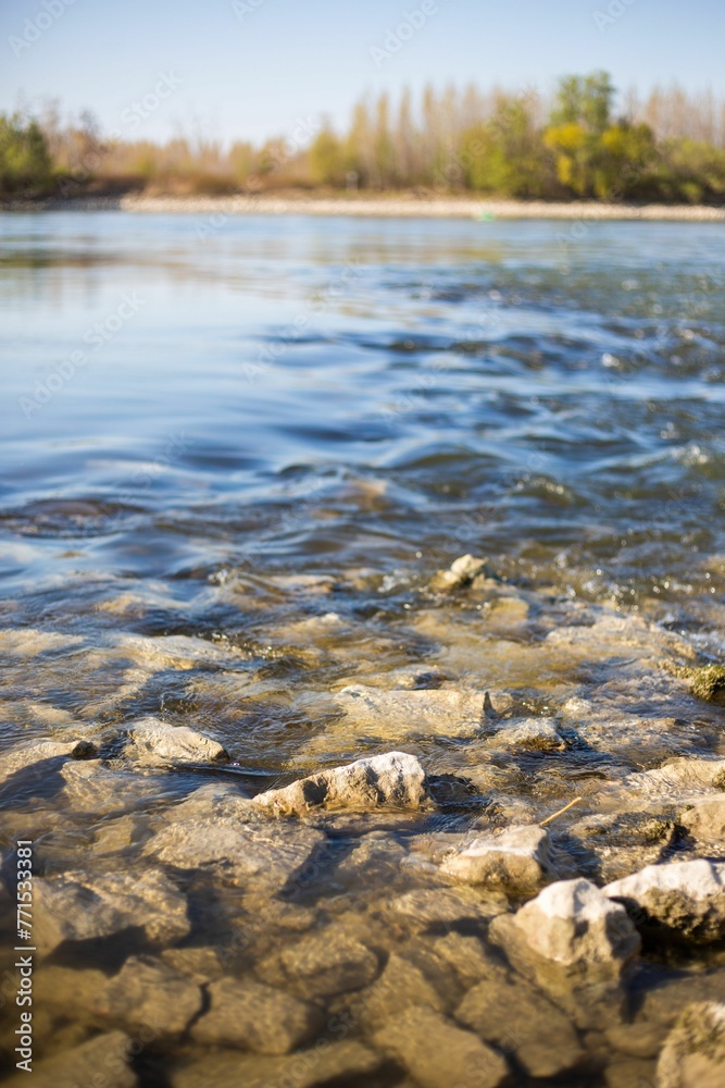 rocks are covered in water as the sun shines on it