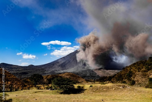 Plume of smoke billows from the active and destructive volcano at Batangan