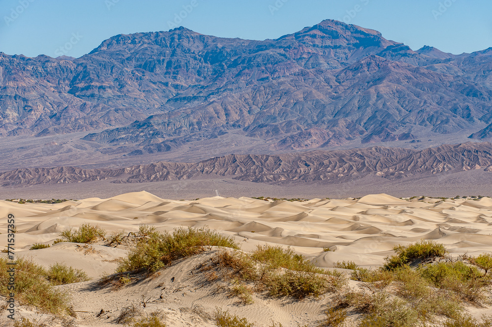 Sand dunes at Mesquite Flats. Death Valley National Park in Inyo County of Mojave Desert, California is the hottest place on earth with a temperature of 56,7 °C recorded in 1913.