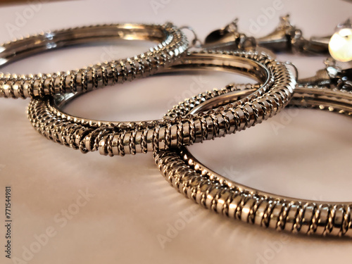 Picture of beautiful jewelry Bracelet made of metal shot during daylight