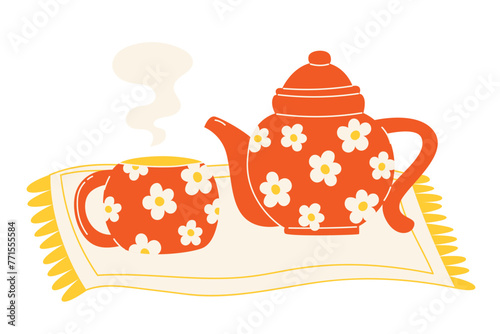 Bright teapot and cup set with chamomile hot tea