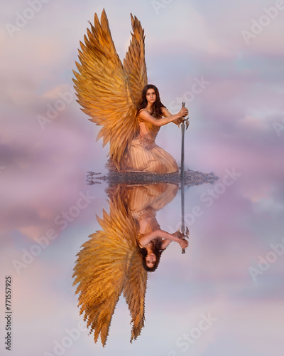 A golden angel kneeling on a pink lake