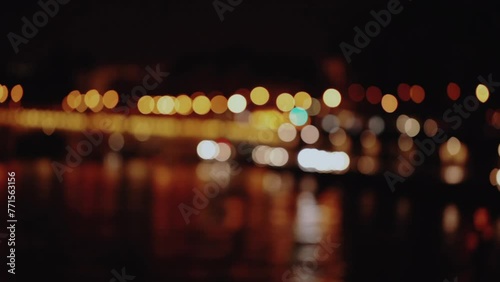 Riverbank expressway defocused lights from traffic at night in Paris photo