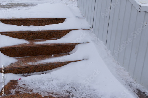 Stair steps covered with snow