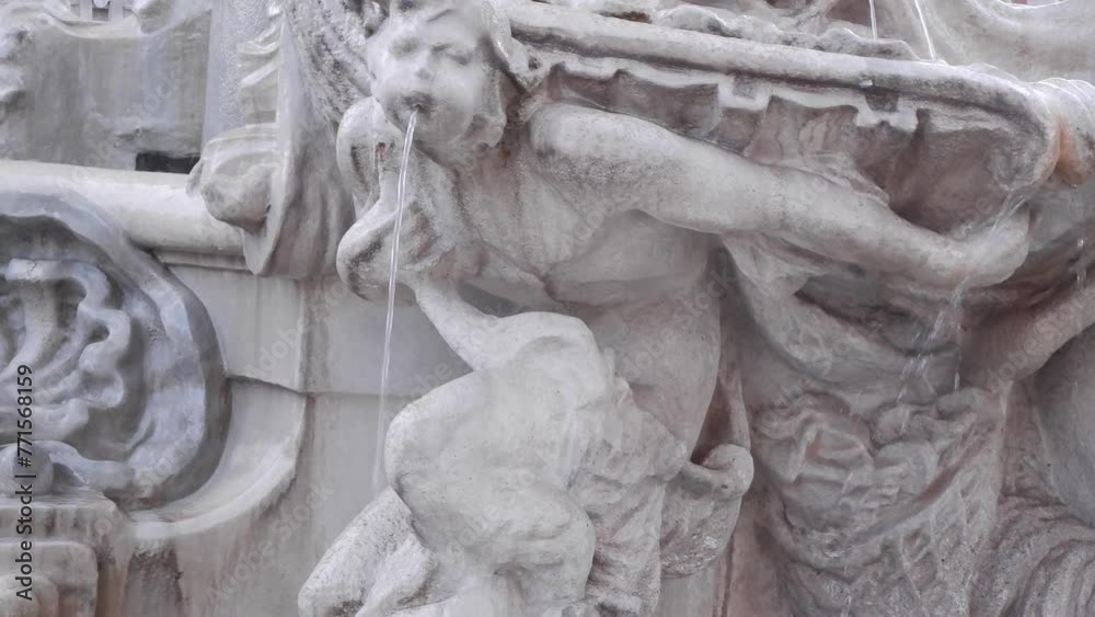 Baroque fountain with sculpture of a person in Rome, Italy Baroque fountain with sculpture of a person in Rome, Italy