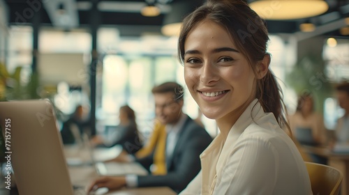 Professional Woman Smiling at Camera in Modern Office Environment. Contemporary Business Setting with Casual Attire. Approachable Employee Portrait. AI