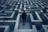 Businessman standing in middle of a maze looking for the right way out , problems and solutions