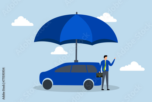 Car insurance, car owner stands with the new car under a strong umbrella cover.