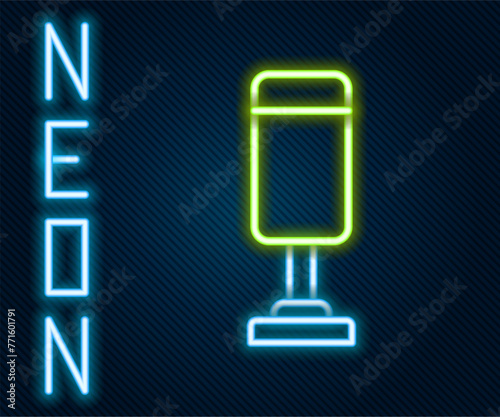 Glowing neon line Punching bag icon isolated on black background. Colorful outline concept. Vector