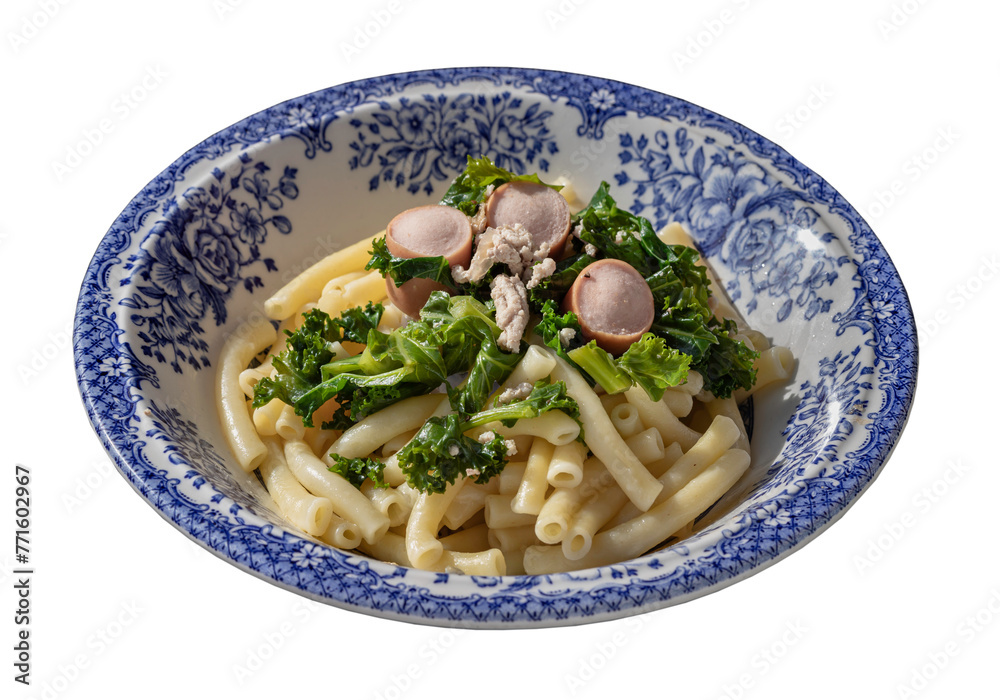 Plate of Penne pasta with Sausage, Pork and Kale isolated on white background with clipping path. Selective Focus.