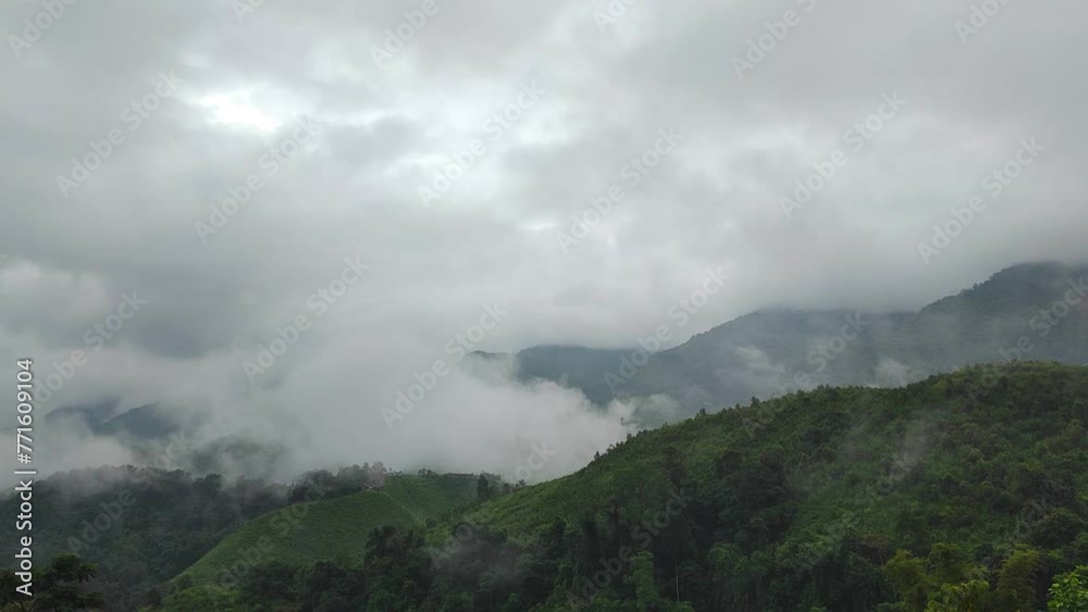 Landscape view Green Nature mountain with Fog cover the mountain at Sapan Village Bo Kluea Nan Thailand in Rainy Season - abstract background - Beautiful natural - Footage 4k Landscape view Green Nature mountain with Fog cover the mountain at Sapan Village Bo Kluea Nan Thailand in Rainy Season - abstract background - Beautiful natural - Footage 4k