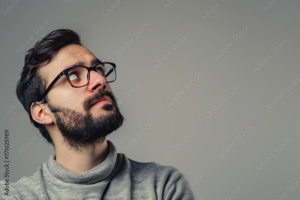 Fototapeta premium man thinking about an idea Isolated on dark grey white background