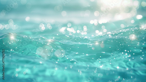 A dreamy  defocused turquoise background  sprinkled with aquamarine bokeh lights  evoking the feel of a tropical ocean sparkling under the sun.